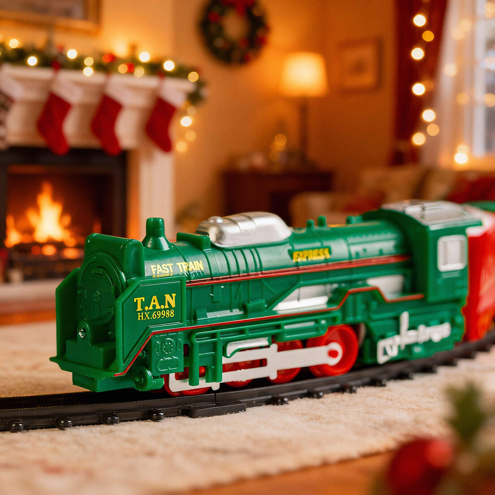 Afbeelding van Kersttrein met licht – 19-delige set – 3 sporen (rond, ovaal, figuur-8) – Batterij aangedreven –